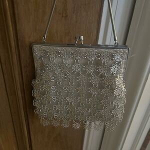 Vintage Safco silver metallic mesh evening bag over silver lining with dangles.